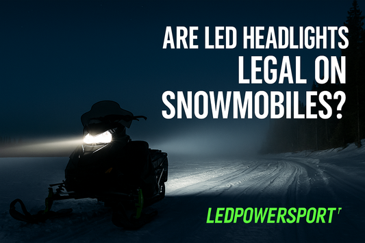 Snowmobile LED headlights at night on snowy trail – Are LED headlights legal off-road