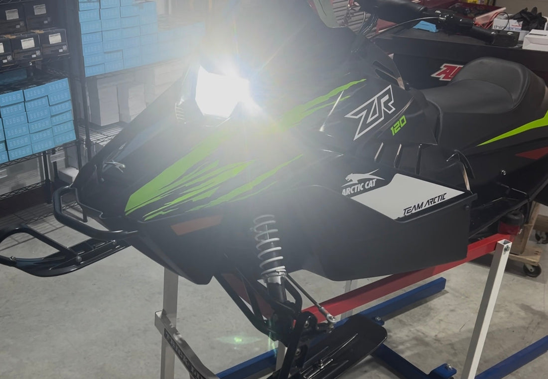 Installing LEDPowersport LED headlight on Arctic Cat ZR120 Youth 120 snowmobile using High Power Series green LED bulb and rectifier.
