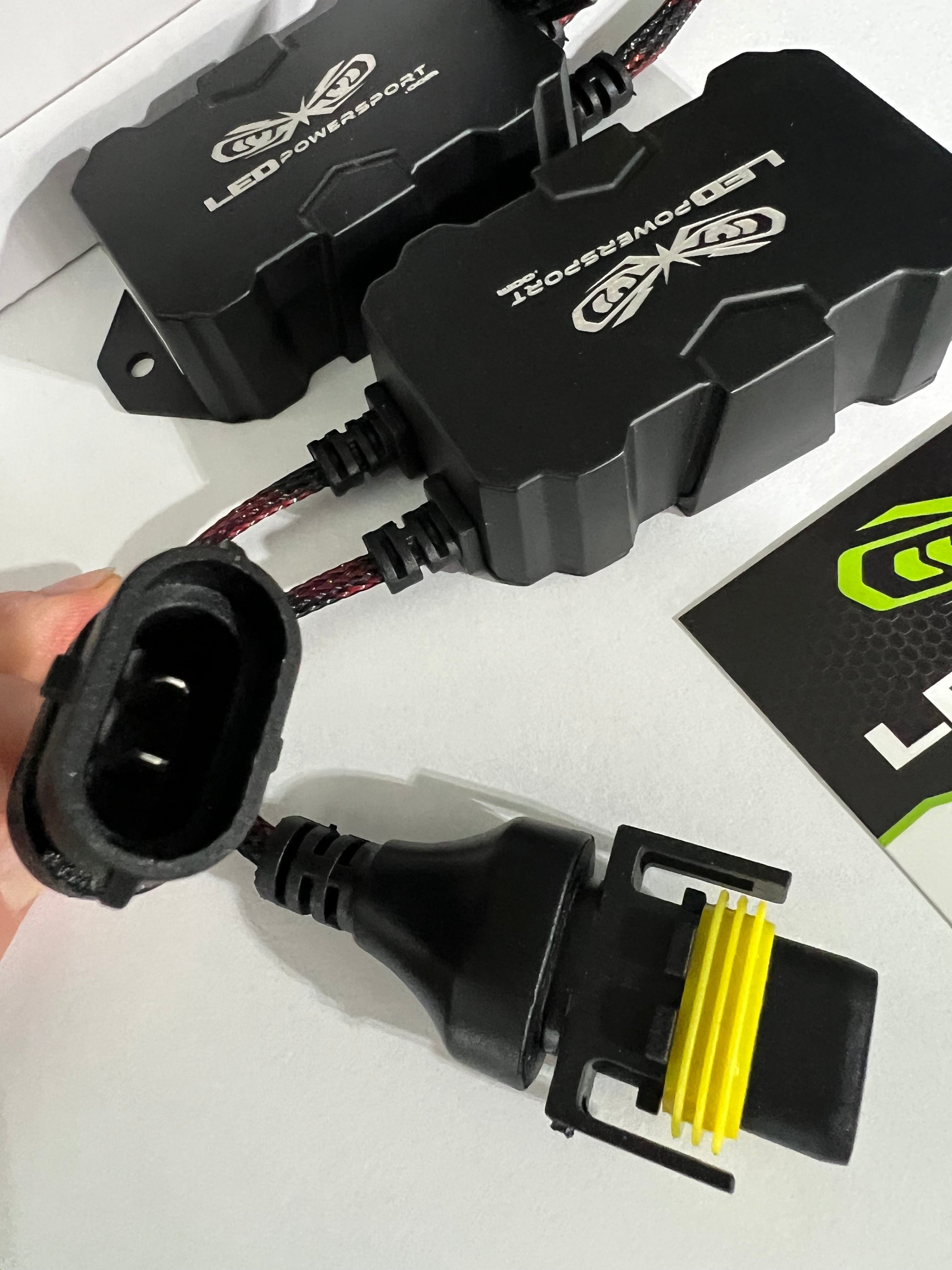 881 880 H11 AC to DC LED headlight rectifier connector detail with yellow seal – LEDPowersport plug-and-play converter.